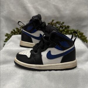 Jordan Kids Black and White Sneakers with Blue Accents
